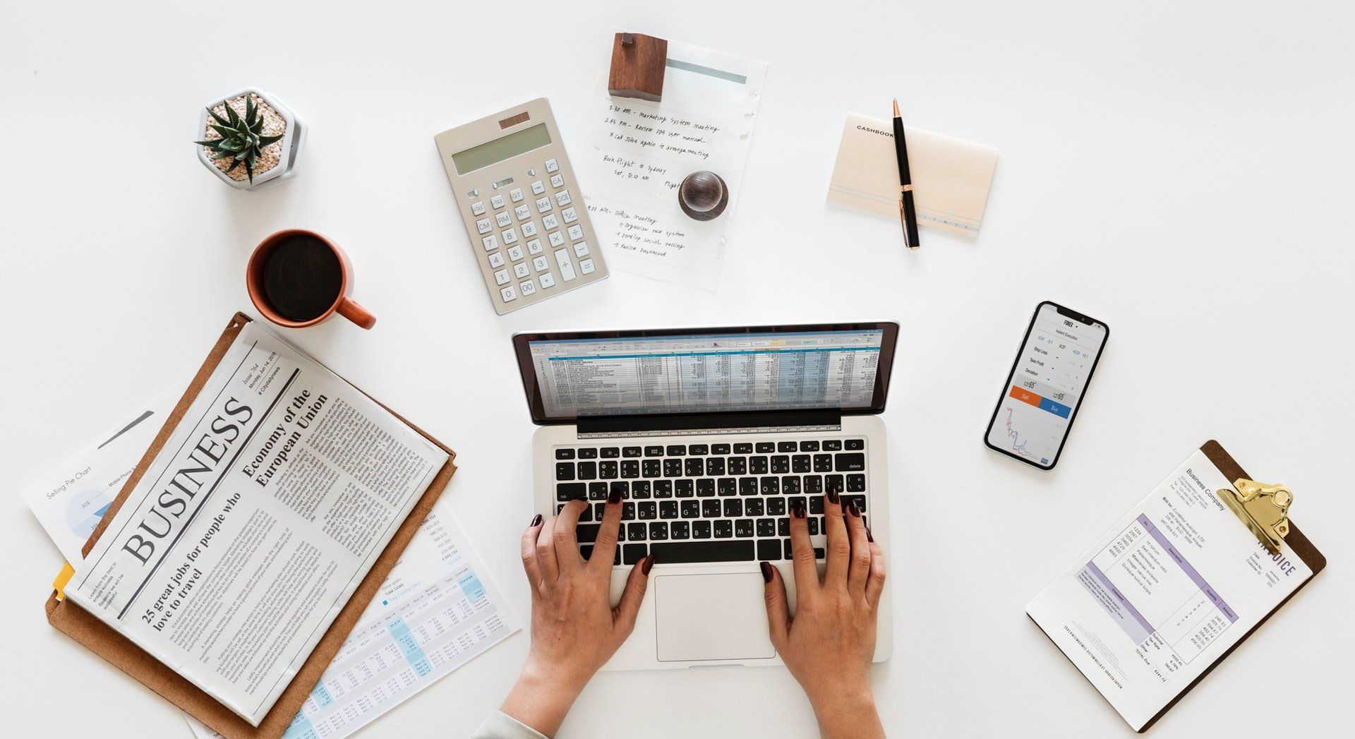 Accountant with calculator planning a new business setup
